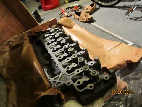 1984 Ford Bronco - A new engine cylinder head is shown, likely for a diesel engine, as indicated by the registry label.