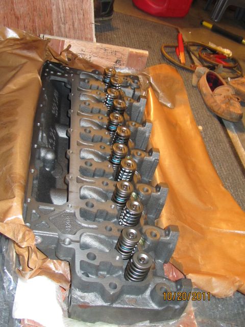 1984 Ford Bronco - Close-up of an engine cylinder head, showing valve train components.
