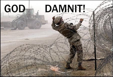 2000 Mercury Grand Marquis - A soldier struggles with barbed wire, with a bulldozer visible in the dusty background.