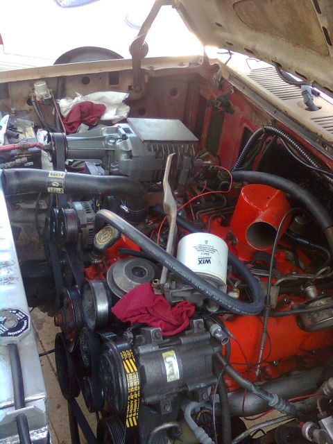 1984 Ford Bronco - Engine bay of a 1984 Ford Bronco showing a supercharger installation.