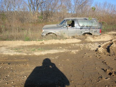 1991 Ford Bronco - This 1991 Ford Bronco is stuck in the mud off-road.