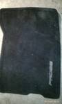 1994 Ford Probe - A black car floor mat is shown, likely for the driver's side.