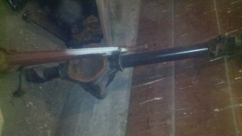 1988 Ford Bronco - A close-up view of a vehicle's solid axle and driveshaft assembly.