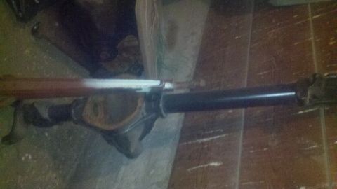 1988 Ford Bronco - Close-up view of a vehicle's rear axle and driveshaft assembly.