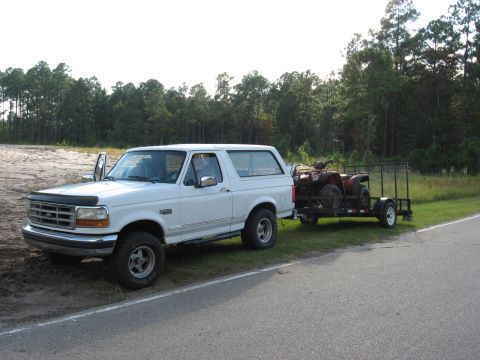 1994 Ford Bronco - Back when I had mud terrains. 6X12 utility trailer with a Honda Rancher 350 and CRF 230.