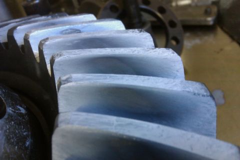 1999 Chevrolet Camaro - Close-up view of worn gear teeth, suggesting mechanical wear.