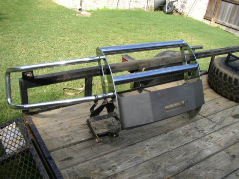 1995 Ford Bronco - Winch bumper assembly on a trailer, with a spare tire visible.
