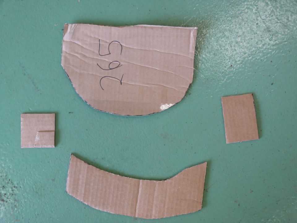 Cardboard cutouts with numbers 265