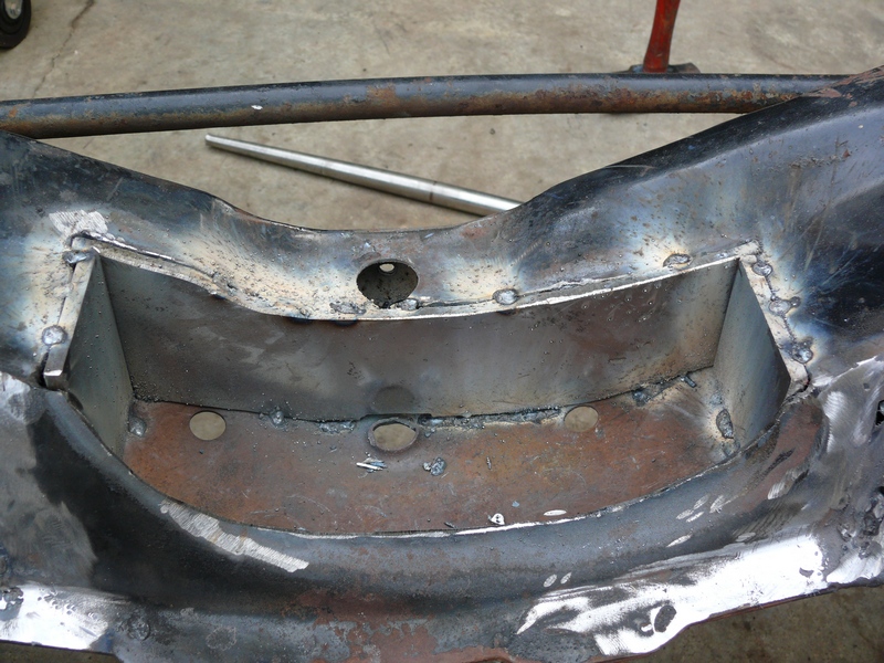 Corvette C3 frame section with visible welds and metal bracing