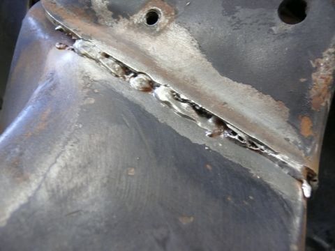 1976 Chevrolet Corvette - This image shows a close-up of a welded metal part, not a 1976 Chevrolet Corvette.