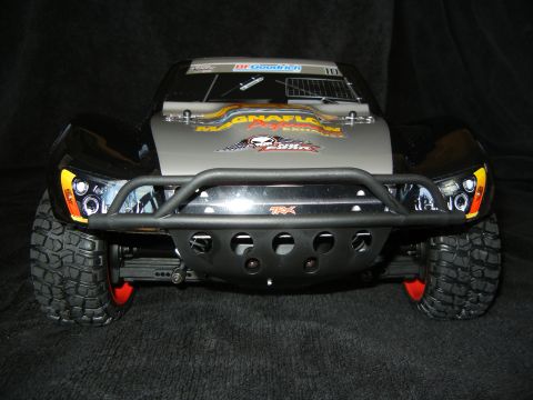 2011 Ford F-150 - This RC truck features aggressive off-road tires and a prominent bull bar on the front.