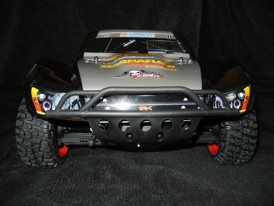 RC truck front view with off-road tires and bull bar