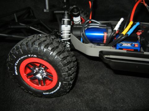 2011 Ford F-150 - This is a close-up of a remote control car's wheel and electric motor, not a 2011 Ford F-150.