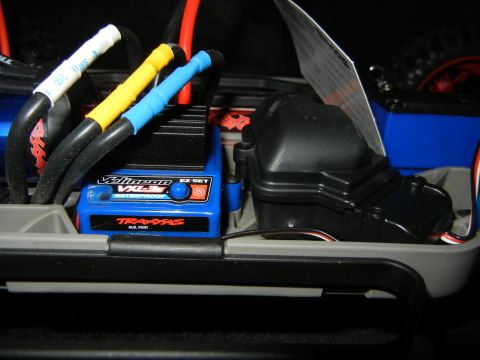 2011 Ford F-150 - Close-up of the electronic speed controller and wiring inside a remote control car.
