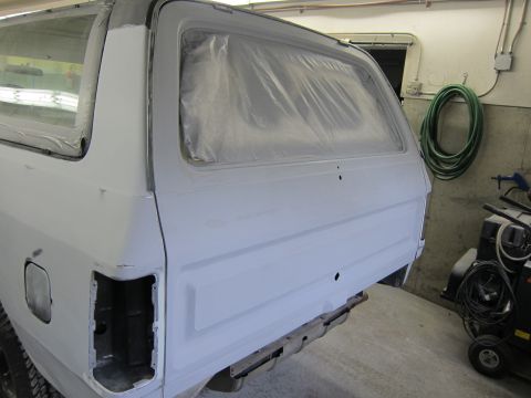 1987 Dodge 1500 - Dodge Ramcharger bodywork in progress, rear view with windows taped for paint prep.