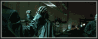 2000 Mercury Grand Marquis - A dimly lit scene depicts multiple individuals in dark, hooded attire, with one figure raising an arm.
