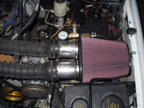 1992 Ford Bronco - Cheap intake modification, courtesy of Dustin from FSB. Remove factory air box and all the crap associated with it, replace with K&N Filter…