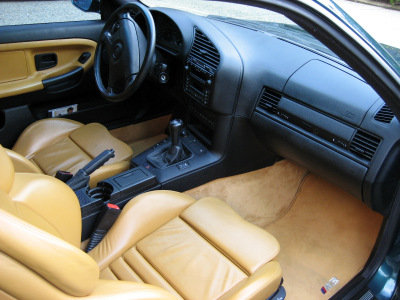 1998 BMW M3 - Interior view of a 1998 BMW M3, tan leather seats and dashboard details.