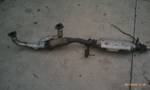 1994 Ford Probe - Catalytic converter and exhaust pipe assembly shown on a concrete surface.