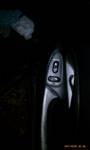 1994 Ford Probe - Close-up of a silver door handle, likely from a car's exterior.