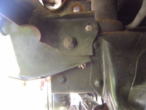 1986 Ford Bronco - Another view of the pass side showing same raised bracket with one bolt holding it to the frame.