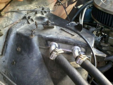 1981 Ford Bronco - This image shows a section of an engine bay, focusing on hoses and other mechanical components.