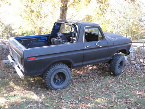 1978 Ford Bronco - This 1978 Ford Bronco appears to be modified for off-road use, a roll cage and large tires.
