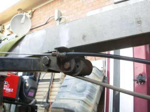 2004 Land Rover Land Rover - There's a tab behind the spring backet that prevents it from rotating on the single bolt.