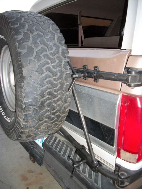 1996 Ford Bronco - Rear view of a 1996 Ford Bronco, showing the spare tire carrier and bumper.