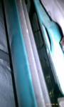 1994 Ford Probe - Close-up of a car's interior door panel, showing a two-tone color scheme.