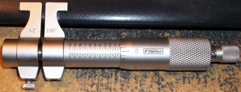 1996 Ford Bronco - A Fowler micrometer with a 1-2 inch measurement range is shown.