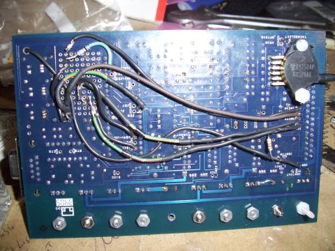 1995 Ford Probe - A blue circuit board with numerous wires connected, a component labeled MPX4250AP and a SuperMotors.net watermark.