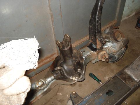1980 Ford Bronco - Close-up view of a front axle assembly, likely for an off-road vehicle, showing the differential and U-joint components.