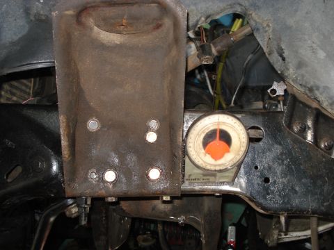 1980 Ford Bronco - Angle gauge attached to vehicle frame for precise measurement of automotive parts.