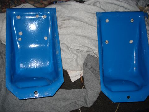 1980 Ford Bronco - Two blue metal brackets are shown, each with several holes for mounting.