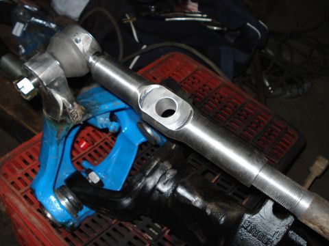 1980 Ford Bronco - Close-up of automotive steering linkage components, possibly for a custom build.