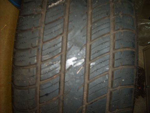 1993 Ford Crown Victoria - Close-up view of a tire tread pattern.