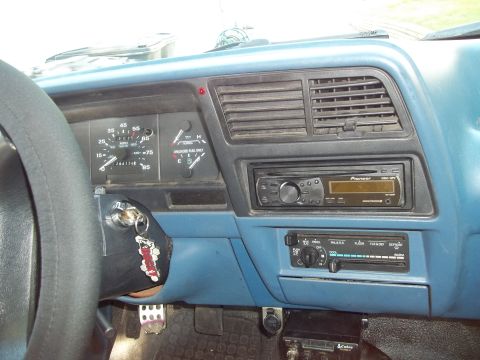 1970 Ford Ranchero - Interior view of a vehicle's dashboard, showing the instrument cluster and audio system.