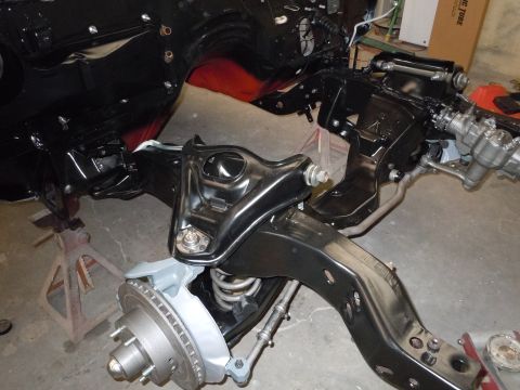 1973 Pontiac Trans Am - Close-up view of a car's chassis and suspension system during restoration.