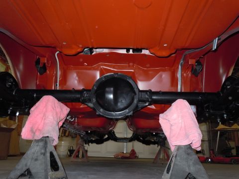 1973 Pontiac Trans Am - Underside view of a vehicle's rear axle assembly supported by jack stands.