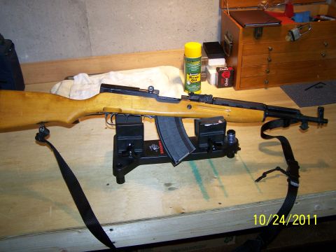 1989 Ford Bronco - An SKS rifle is displayed on a workbench, accompanied by a toolbox and cleaning supplies. The photo was taken on October 24, 2011.