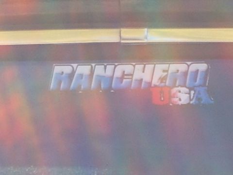 1973 Ford Ranchero - Close-up of the 'Ranchero USA' emblem, likely from a 1973 Ford Ranchero.