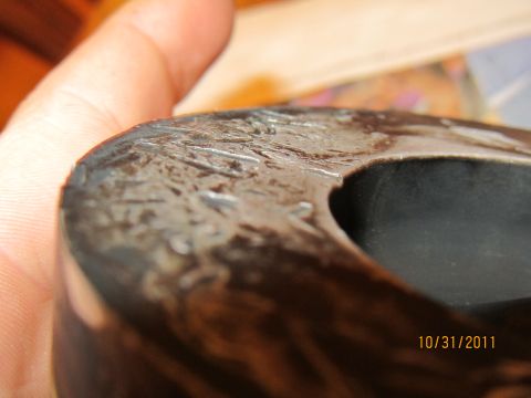 1984 Ford Bronco - A close-up shows a damaged metal component with visible scratches and a date stamp from 2011.