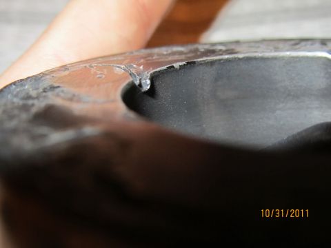 1984 Ford Bronco - A close-up view of a metal part shows a drip of clear liquid, with a Supermotors.net watermark visible.