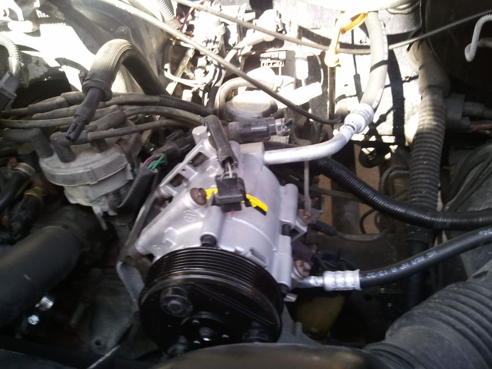 1994 Ford Bronco AC compressor with hoses and belt