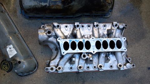 1990 Ford Bronco - wire wheeled the gaskets off, still gotta clean it more.
