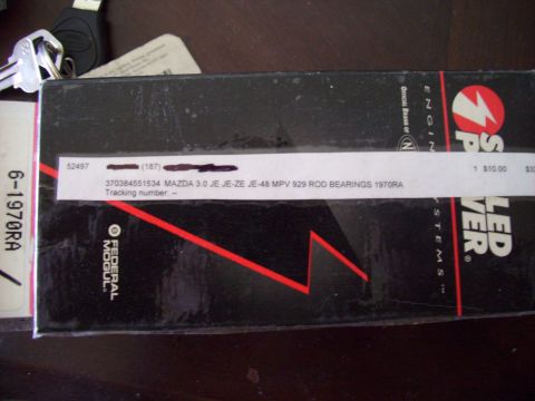 1995 Ford Probe - A box of Federal Mogul engine rod bearings is shown, with part details for a Mazda 3.0L JE-ZE engine.
