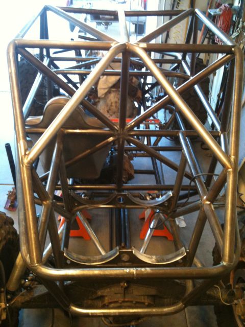 1966 Ford Bronco - Custom buggy roll cage construction in progress, showing the frame and seats.