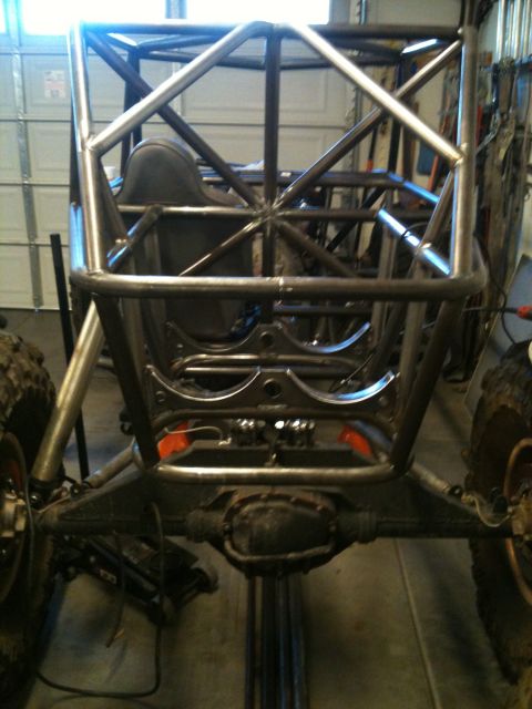 1966 Ford Bronco - Custom buggy chassis under construction, showing roll cage and rear axle assembly.