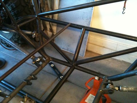 1966 Ford Bronco - A close-up view of a custom buggy's tubular frame and suspension parts, with a Supermotors.net watermark visible.